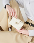 Victoria Hyde Rosi milk-white genuine leather wallet with 23 card slots, bill compartment, and zippered coin pocket. Multifunctional and elegant.