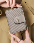 Victoria Hyde Rosi nude genuine leather wallet, multifunctional design with 19 card slots, bill compartment, and zippered coin pocket.
