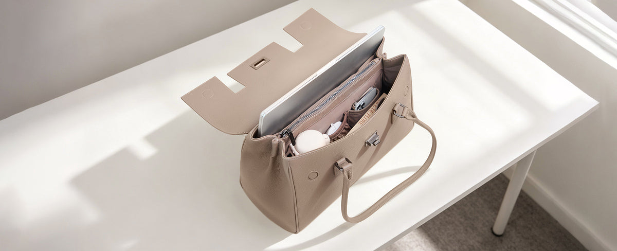 Victoria Hyde London Jolene Large Handbag in beige — open view showing interior organization compartments, fits up to 16" laptop, structured microfiber leather work bag