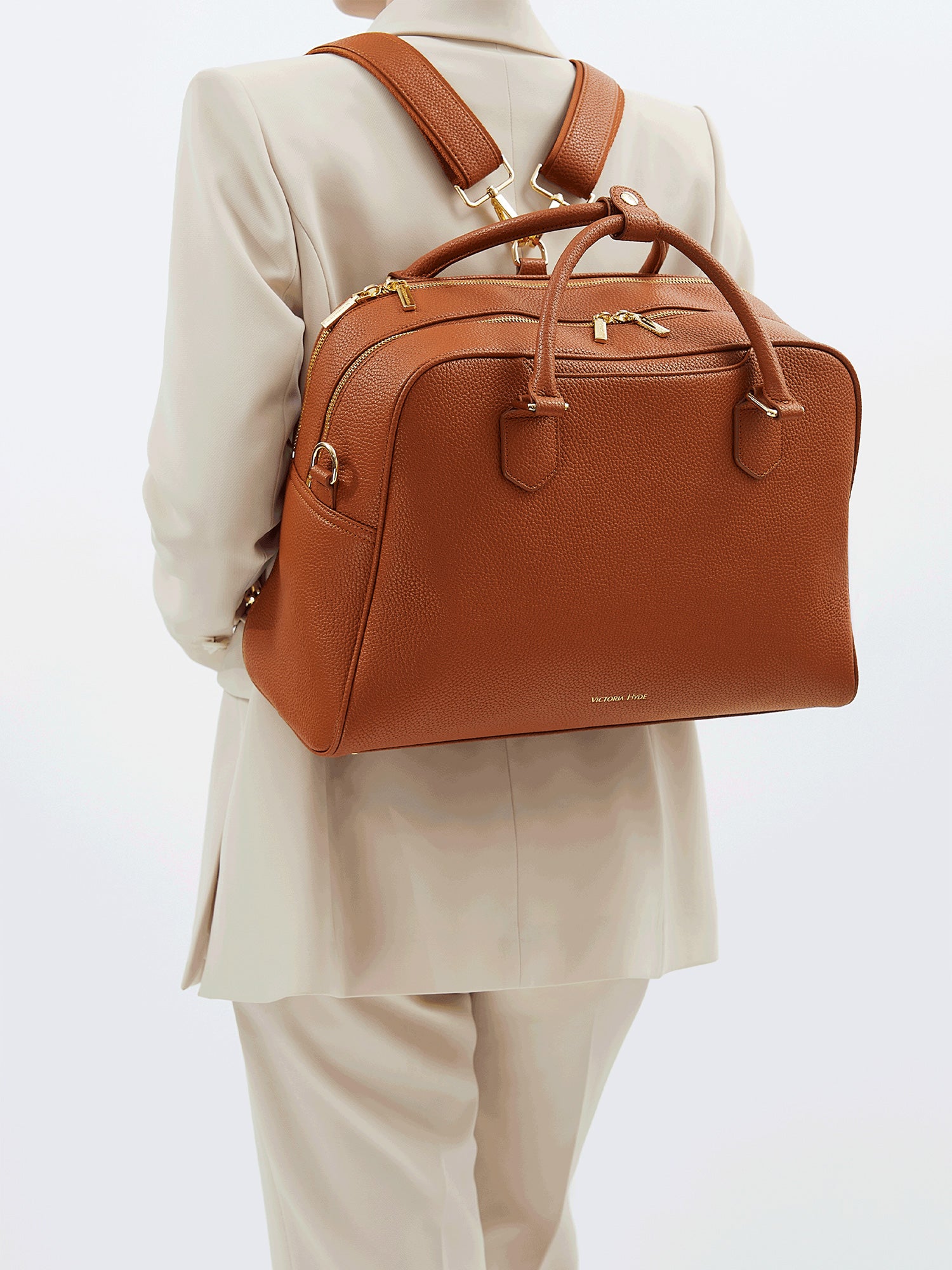 Victoria Hyde Amal 2-in-1 convertible laptop backpack and handbag in brown, vegan leather business bag with 14-inch laptop compartment