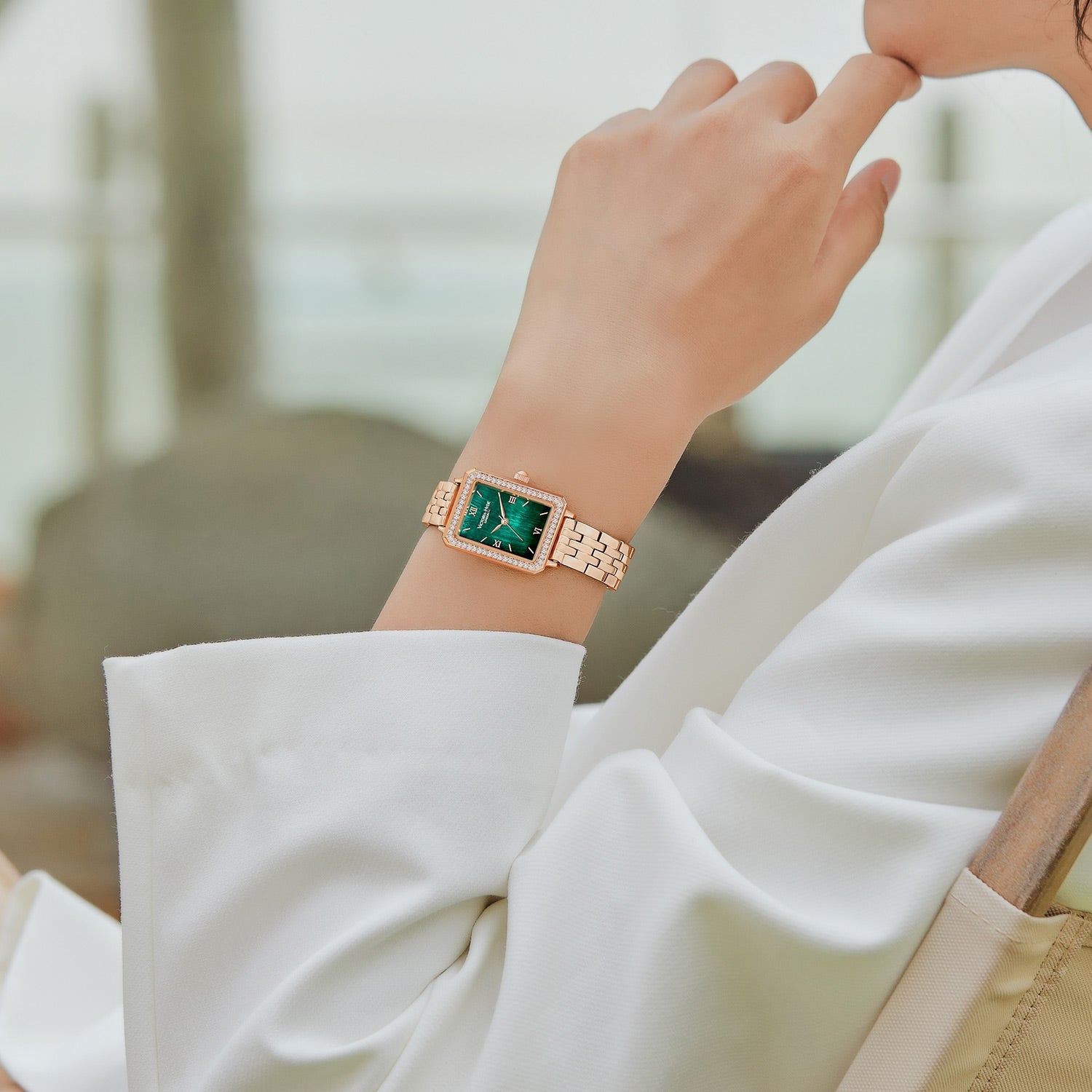 Victoria Hyde Westminster women's watch in rose gold with green dial, square case, stainless steel bracelet, classic elegant design.