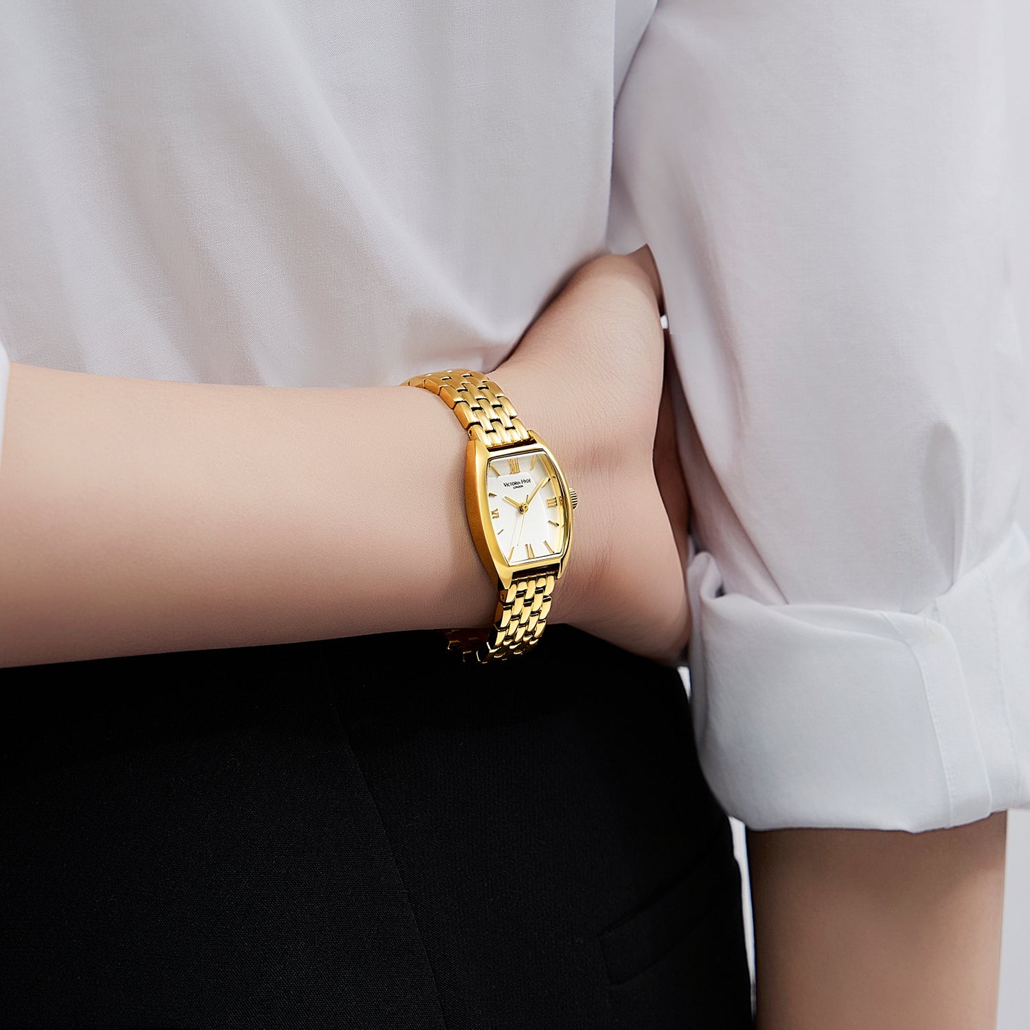 Victoria Hyde London BARREL watch, light gold tonneau case, silver sand-effect dial, stainless steel bracelet, quartz movement.