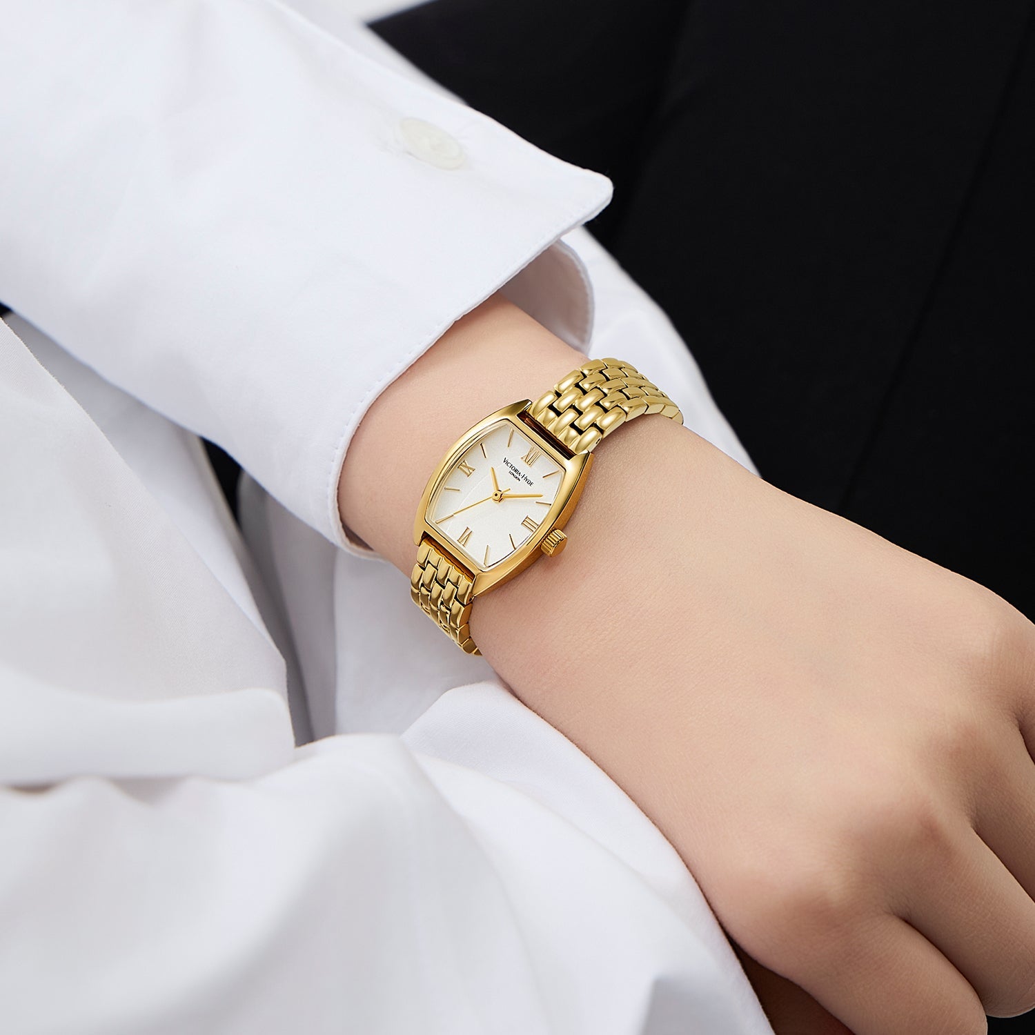 Victoria Hyde London BARREL watch, light gold tonneau case, silver sand-effect dial, stainless steel bracelet, quartz movement.