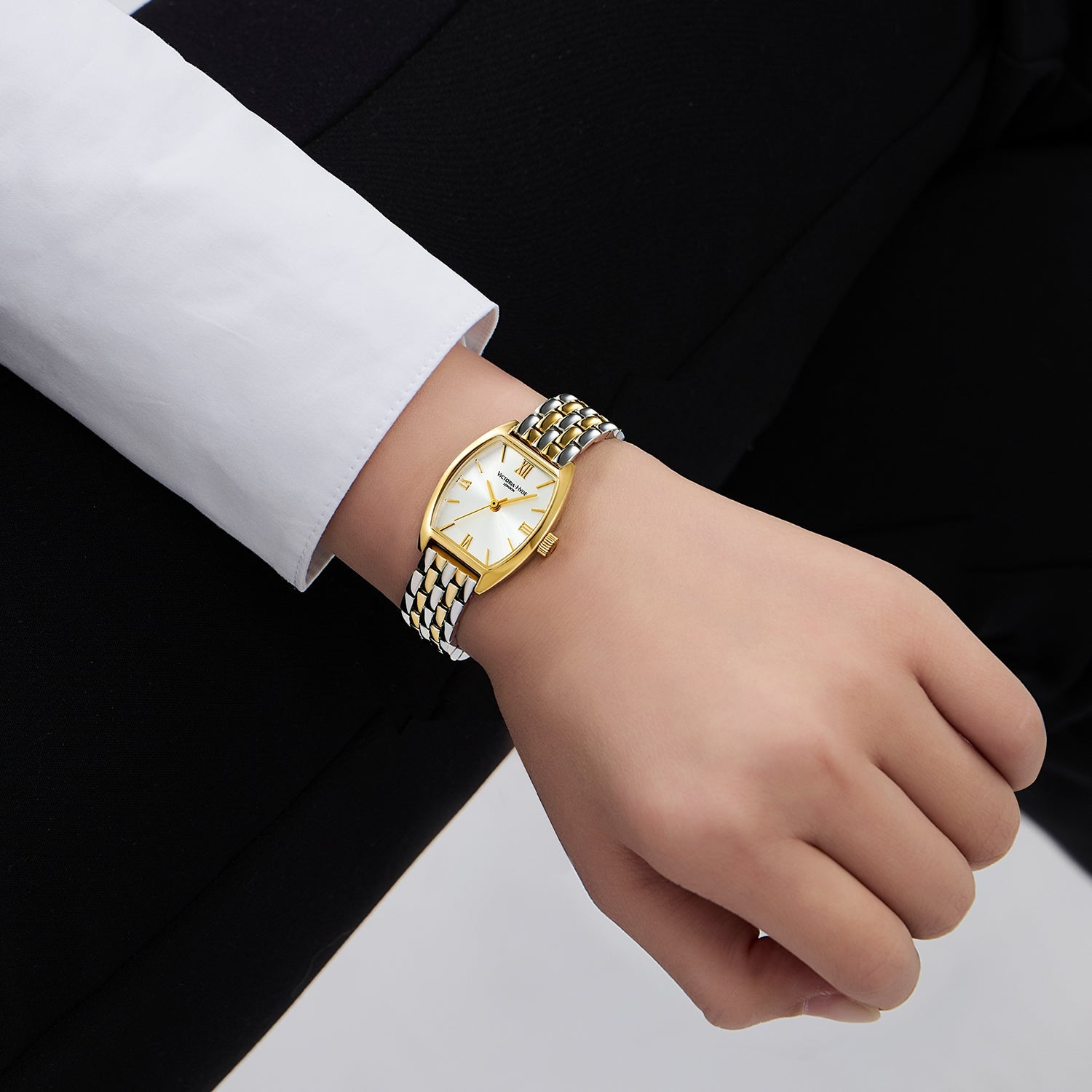 Victoria Hyde BARREL watch: silver gold tonneau case, sunburst dial, stainless steel bracelet, quartz movement, 3ATM.
