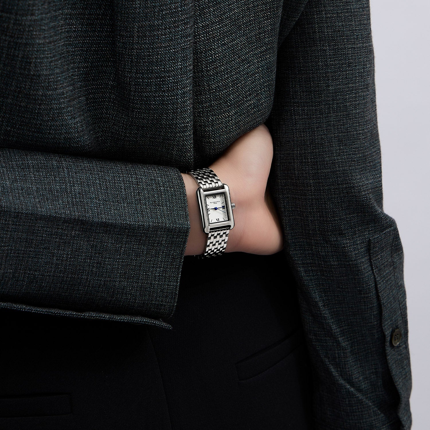 Silver square watch by Victoria Hyde London Retro series: copper case, sand-effect dial, stainless steel bracelet, quartz movement, 3ATM.