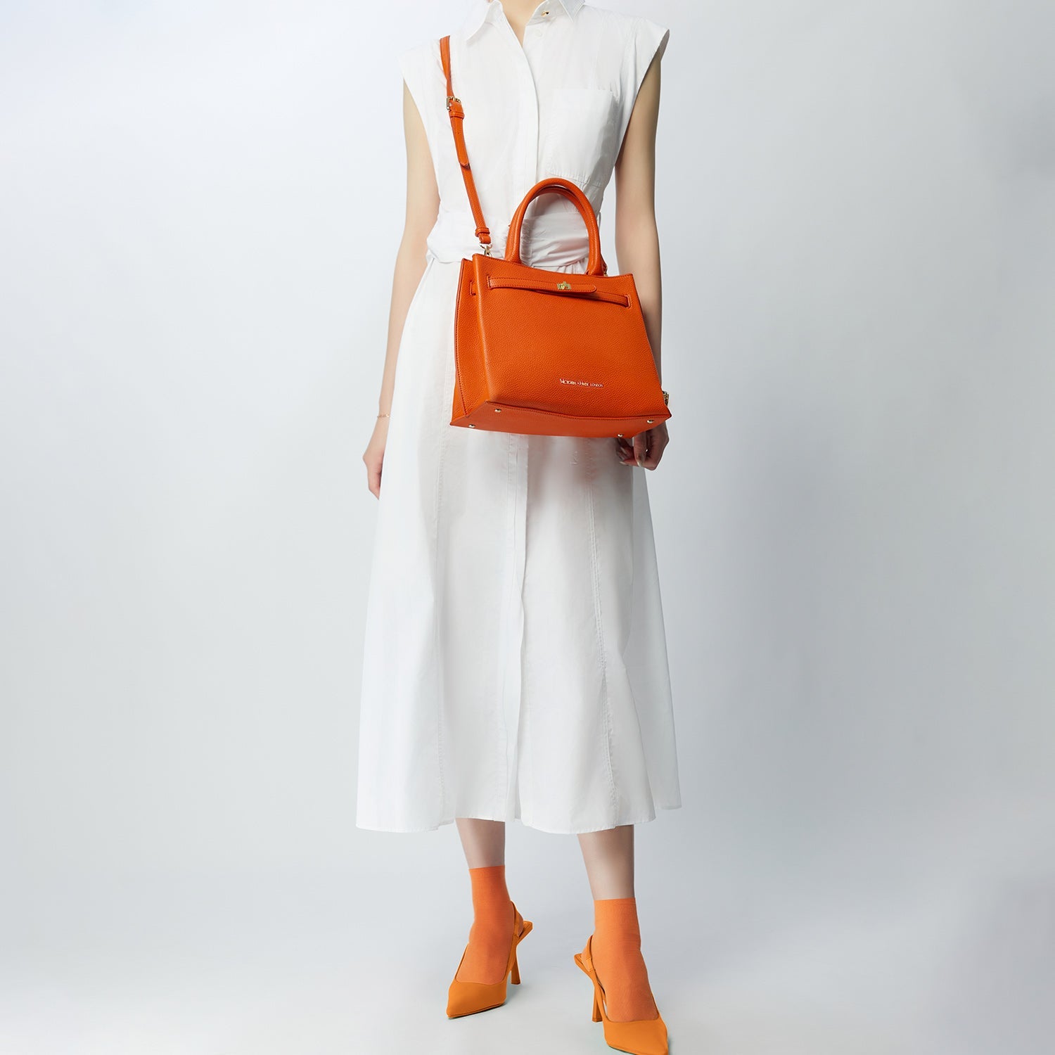 Victoria Hyde Lambeth elegant work handbag with gold accents, convertible shoulder bag, sustainable faux leather, perfect for executives.