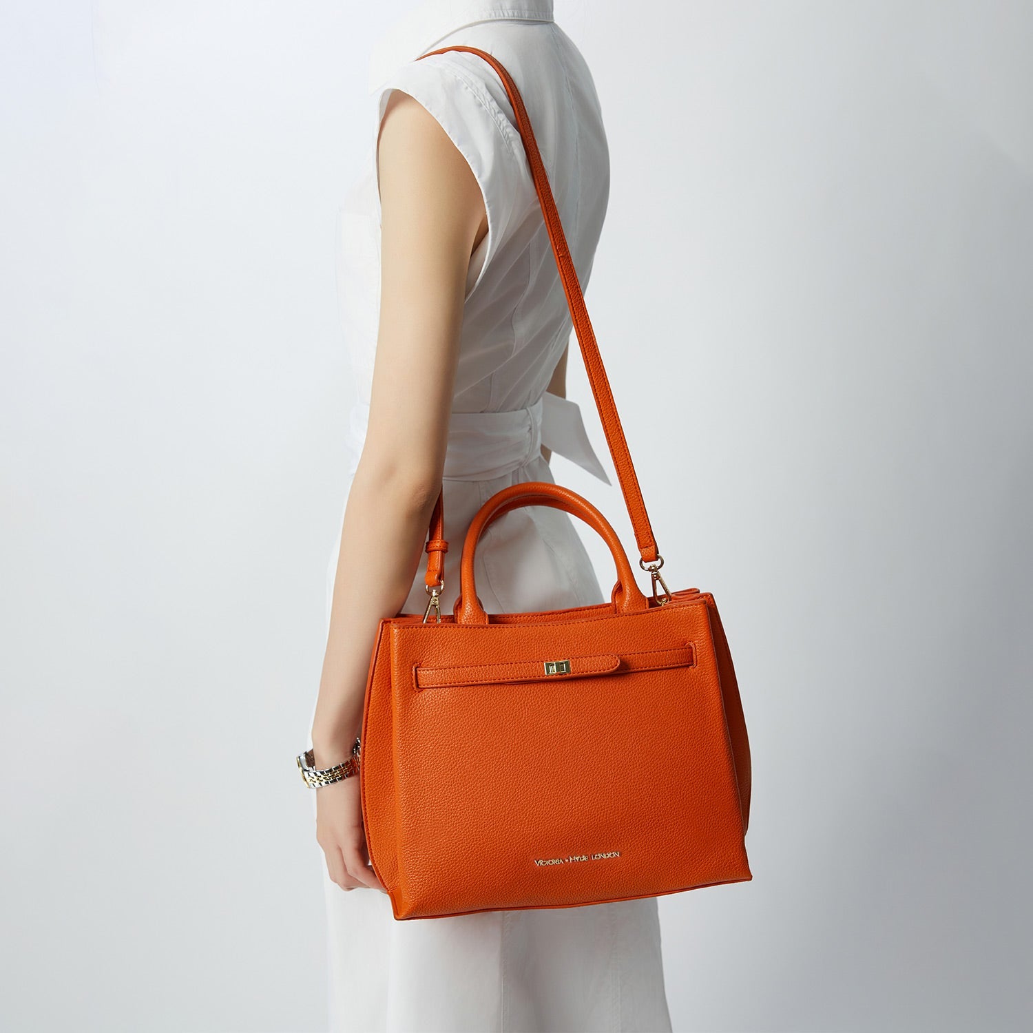 Victoria Hyde Lambeth elegant work handbag with gold accents, convertible shoulder bag, sustainable faux leather, perfect for executives.