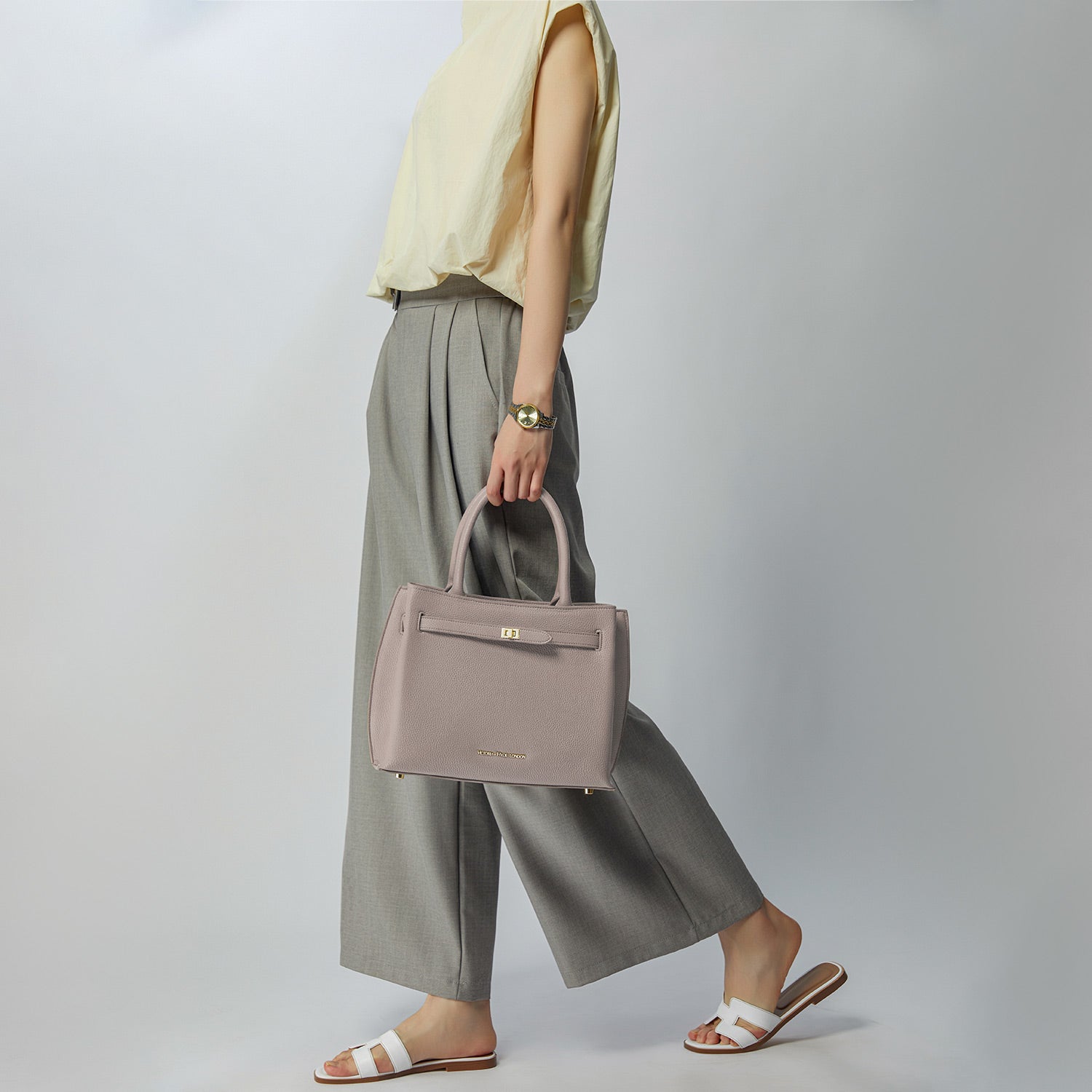 Victoria Hyde Lambeth elegant faux leather shoulder bag with gold accents, sustainable, structured interior, perfect work handbag for women.