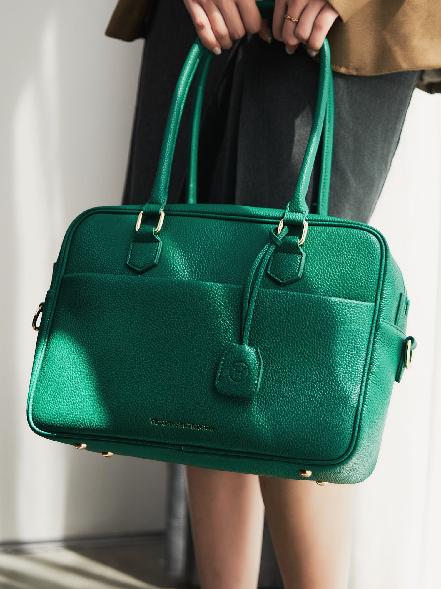 Victoria Hyde Margaret large green work bag with 13" laptop compartment, removable cosmetic pouch, vegan, water-repellent, smart interior.