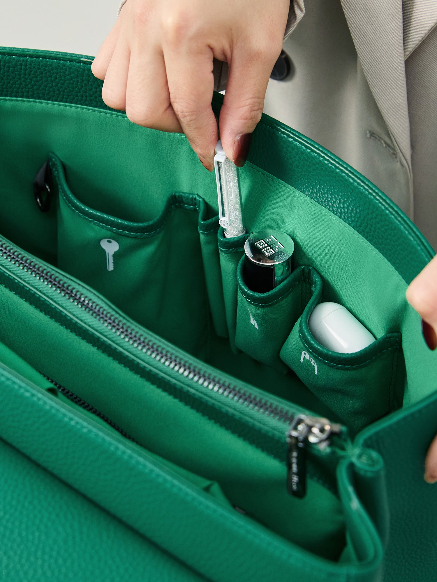Green Victoria Hyde Jolene large work bag with padded laptop compartment, smart interior, removable cosmetic pouch, vegan, water-repellent, perfect for working mothers.