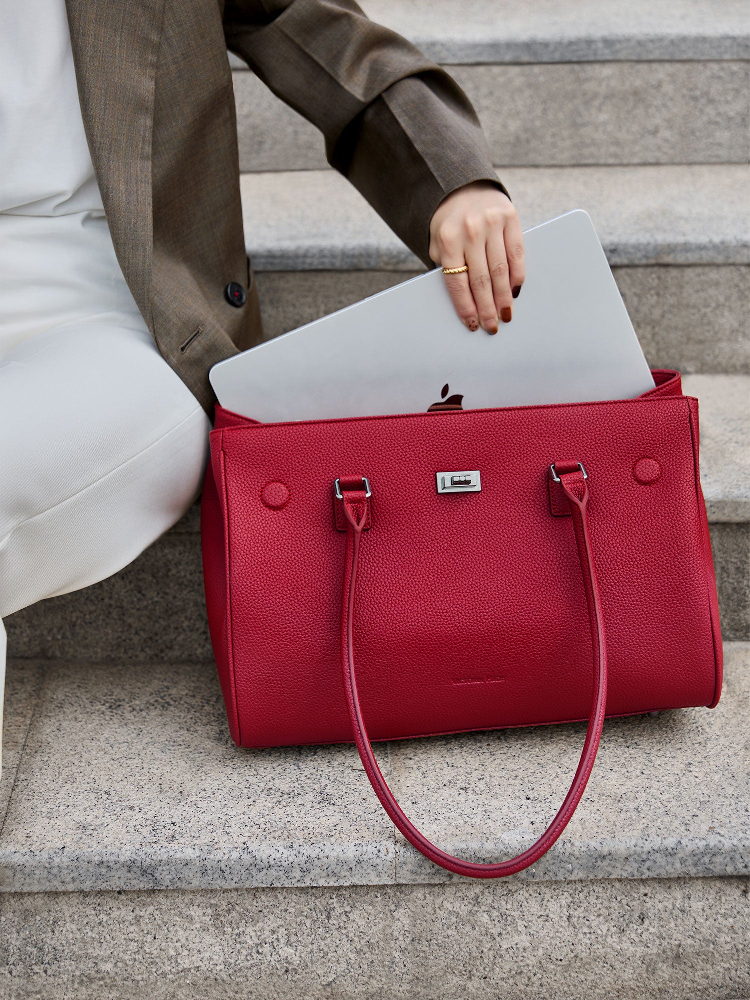 Victoria Hyde Jolene large tote in Garnet Red. Microfiber leather, fits 16" laptop, removable pouch, smart interior, water-repellent.