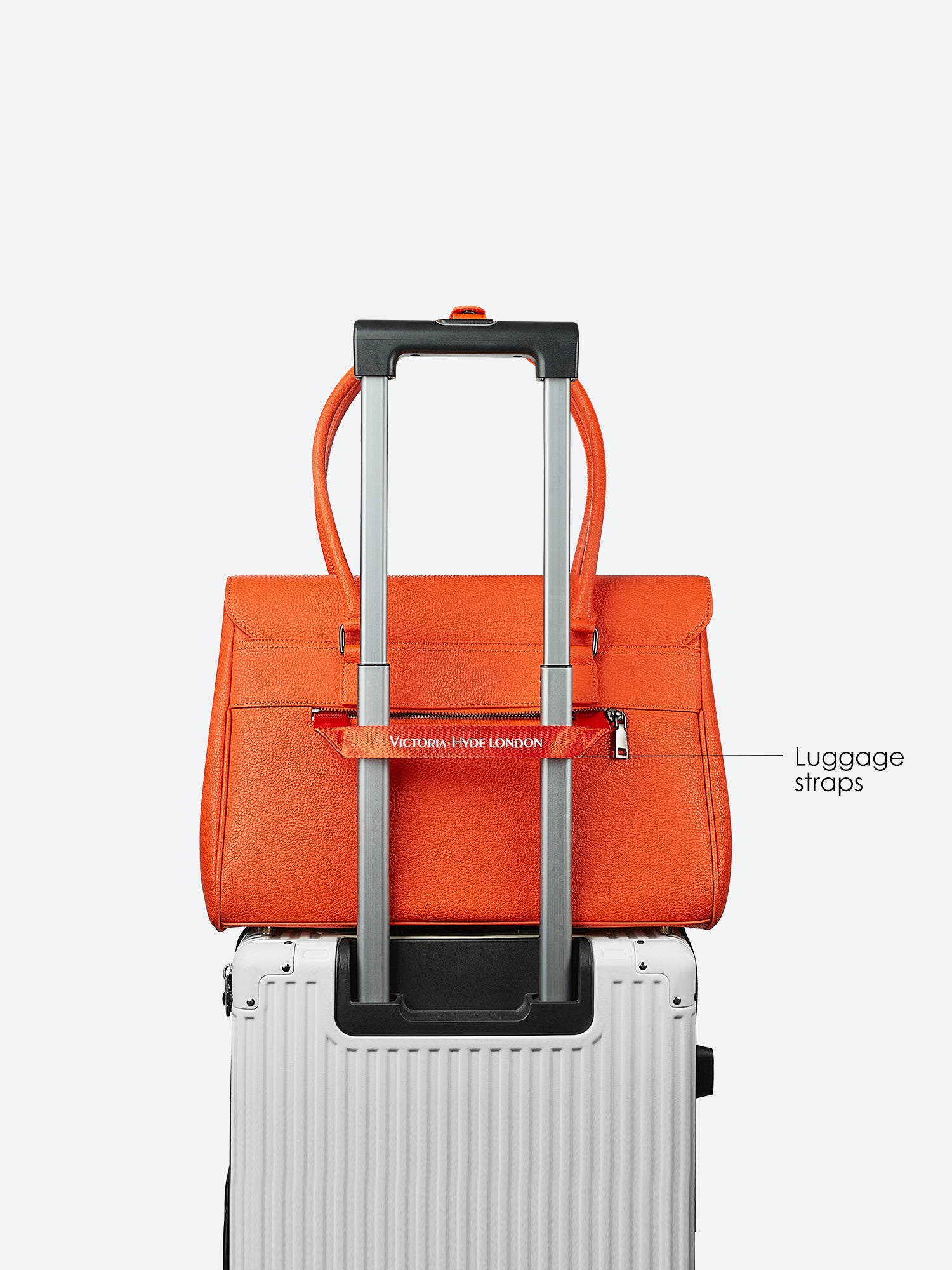 Victoria Hyde Jolene large orange work bag with 15" laptop compartment, removable cosmetic pouch, vegan, water-repellent, smart organization.