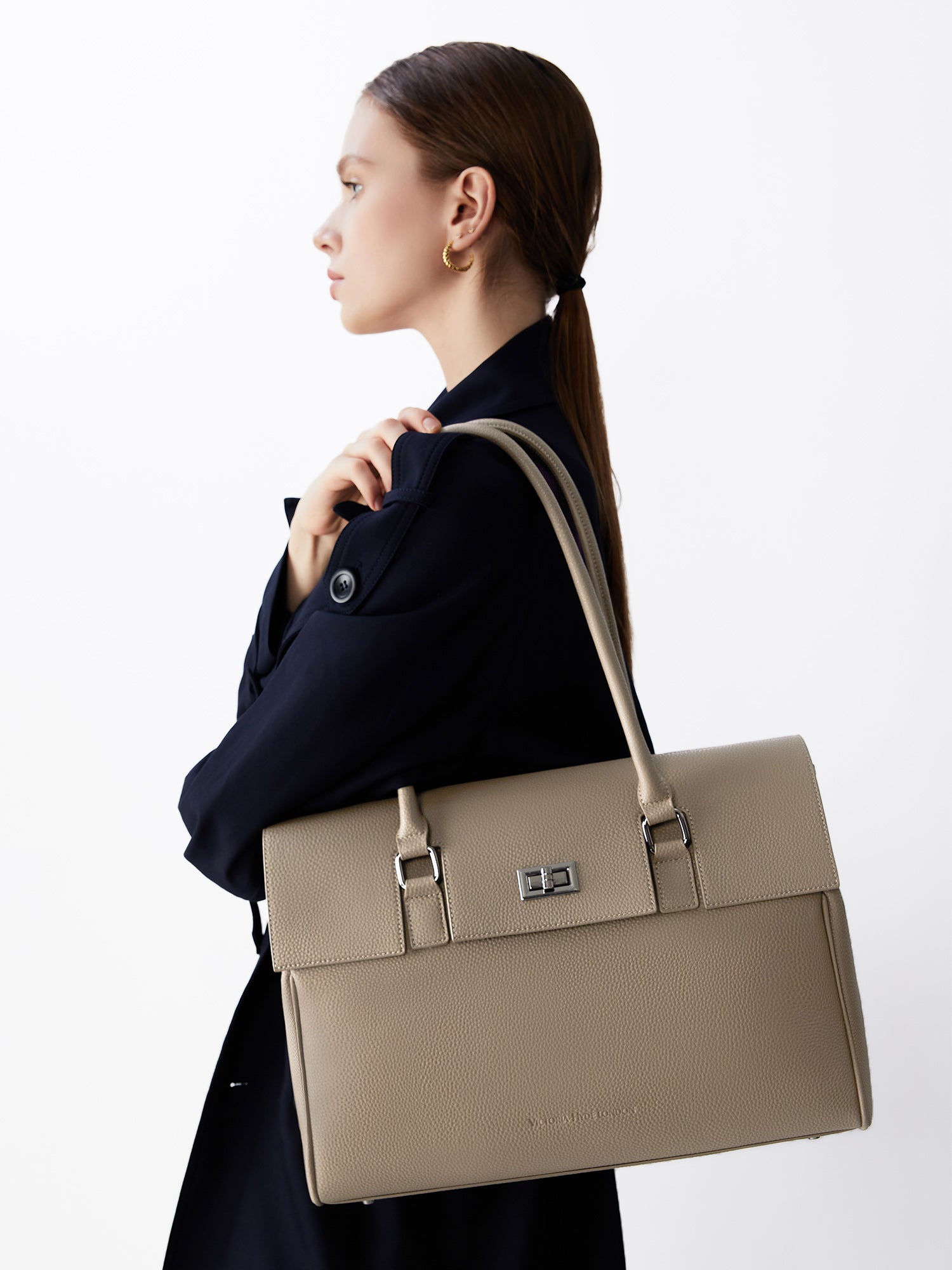 Victoria Hyde Jolene large beige work bag with 15" laptop compartment, removable cosmetic pouch, vegan, water-repellent, smart interior organization.