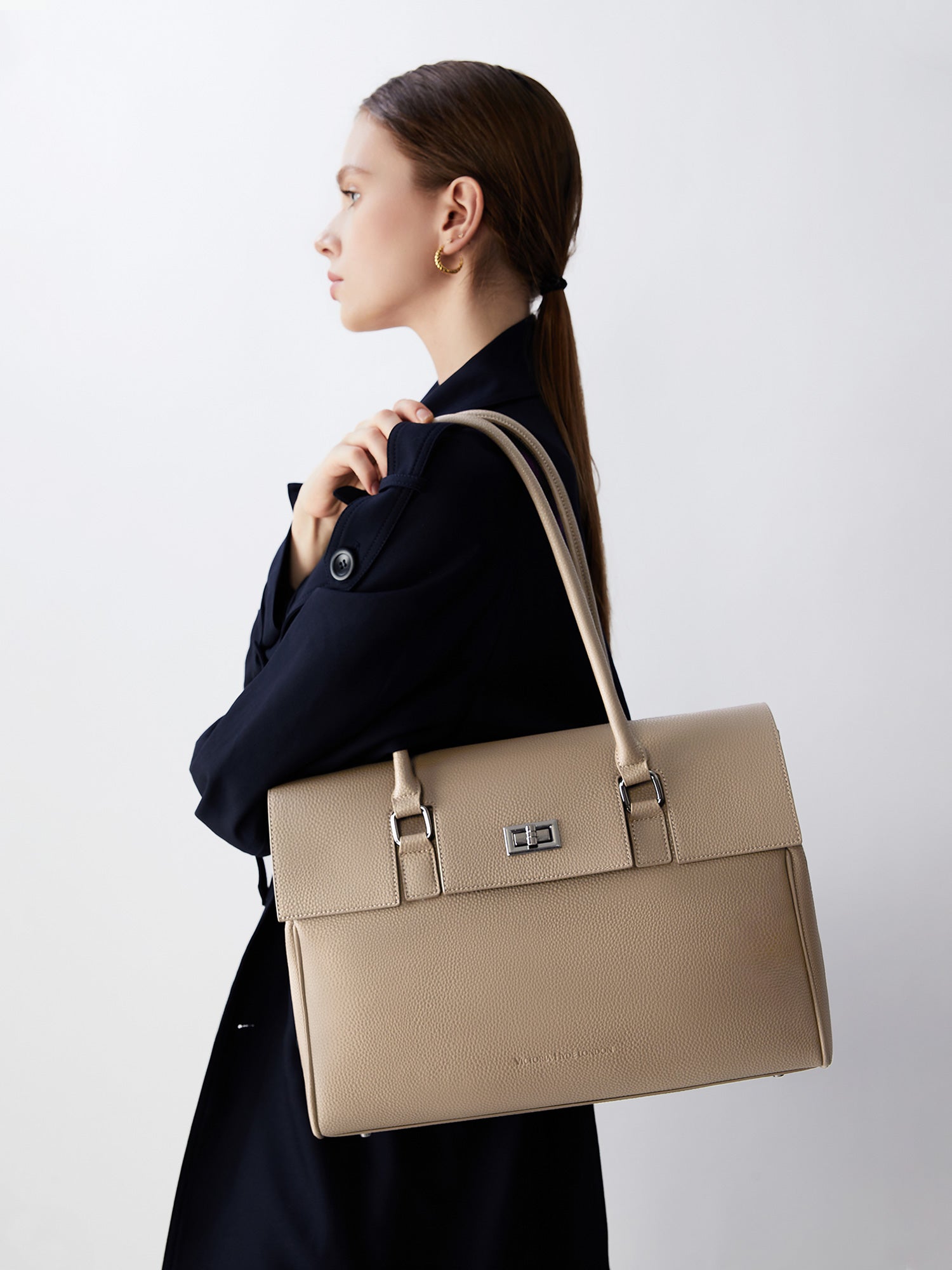 Victoria Hyde Jolene large beige work bag with 15" laptop compartment, removable cosmetic pouch, vegan, water-repellent, smart interior organization.