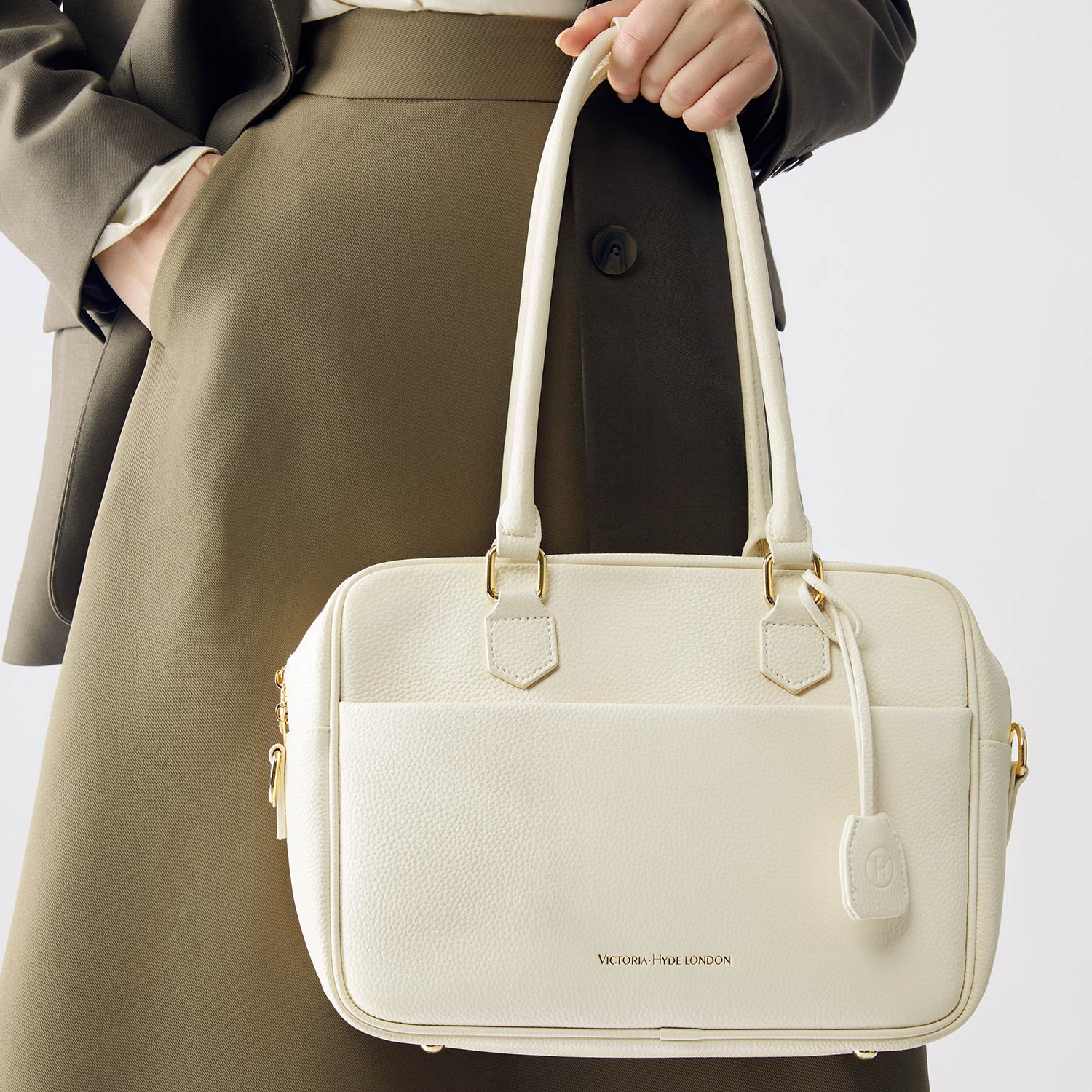 Elegant Victoria Hyde Margaret Small work bag in Moon White, with tablet compartment, vegan microfiber leather, and smart organizer for professional women.