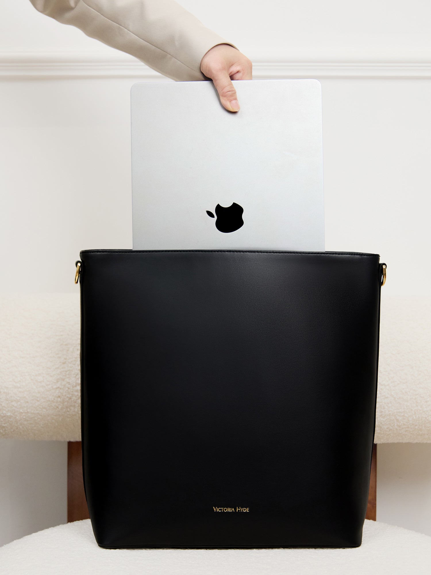 Minimalist black work bag Kloey Large by Victoria Hyde. Vegan, water-repellent, fits 13" laptop. Elegant daily essential for power women.