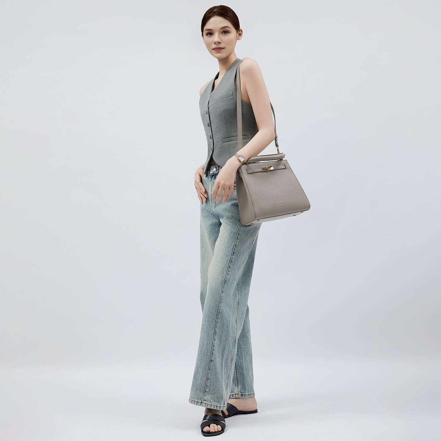 Victoria Hyde Victoria III crossbody work bag in PU leather with gold hardware, fits 12.9" tablet, organized interior for professional women.