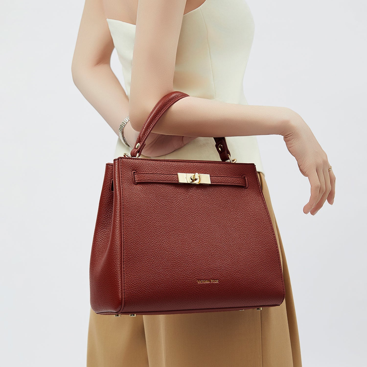 Victoria Hyde Victoria III crossbody work bag in PU leather, tablet-friendly up to 12.9", smart interior organization, elegant office bag.