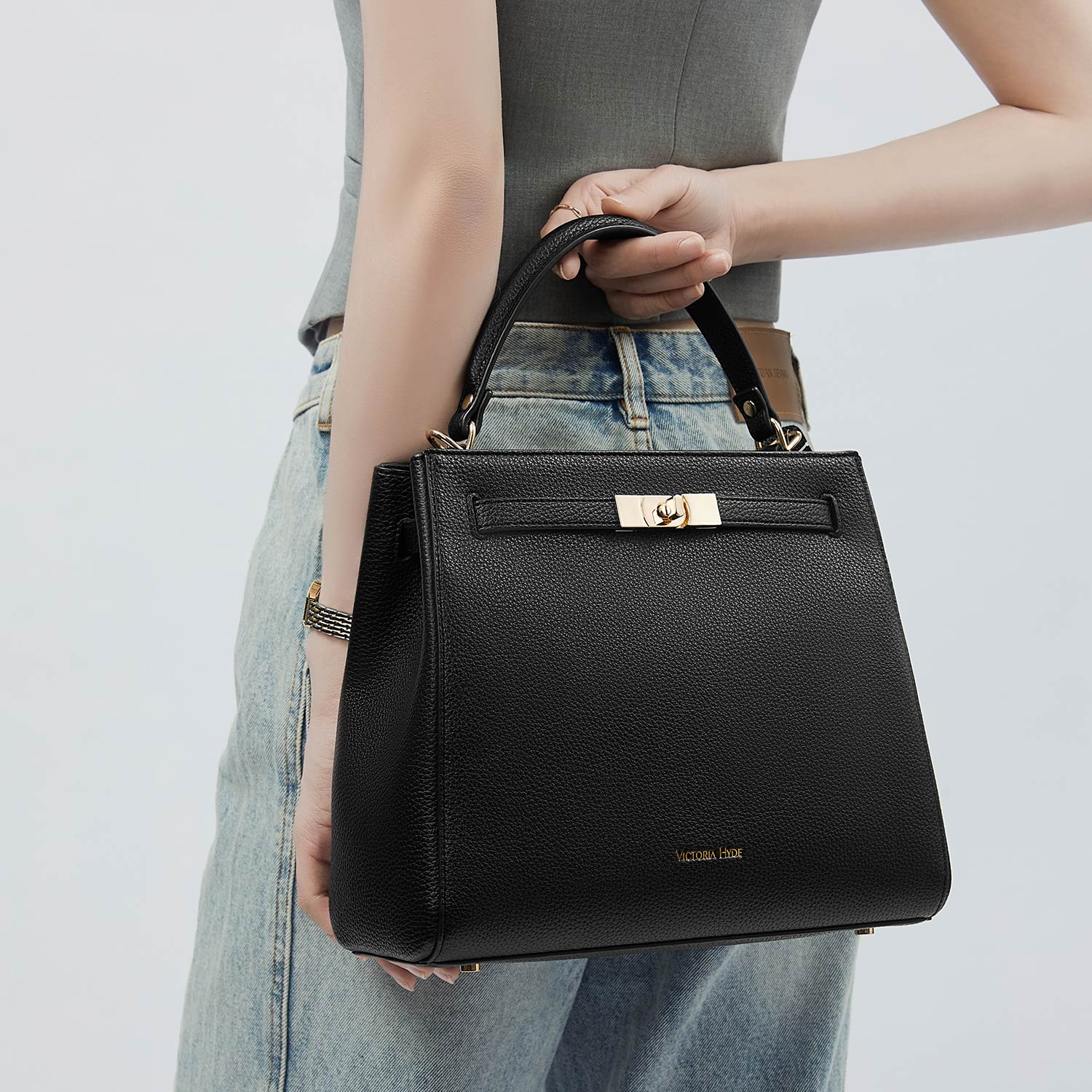 Victoria Hyde Victoria III crossbody work bag with 12.9" tablet compartment, PU leather, smart organizer compartments, elegant gold hardware.