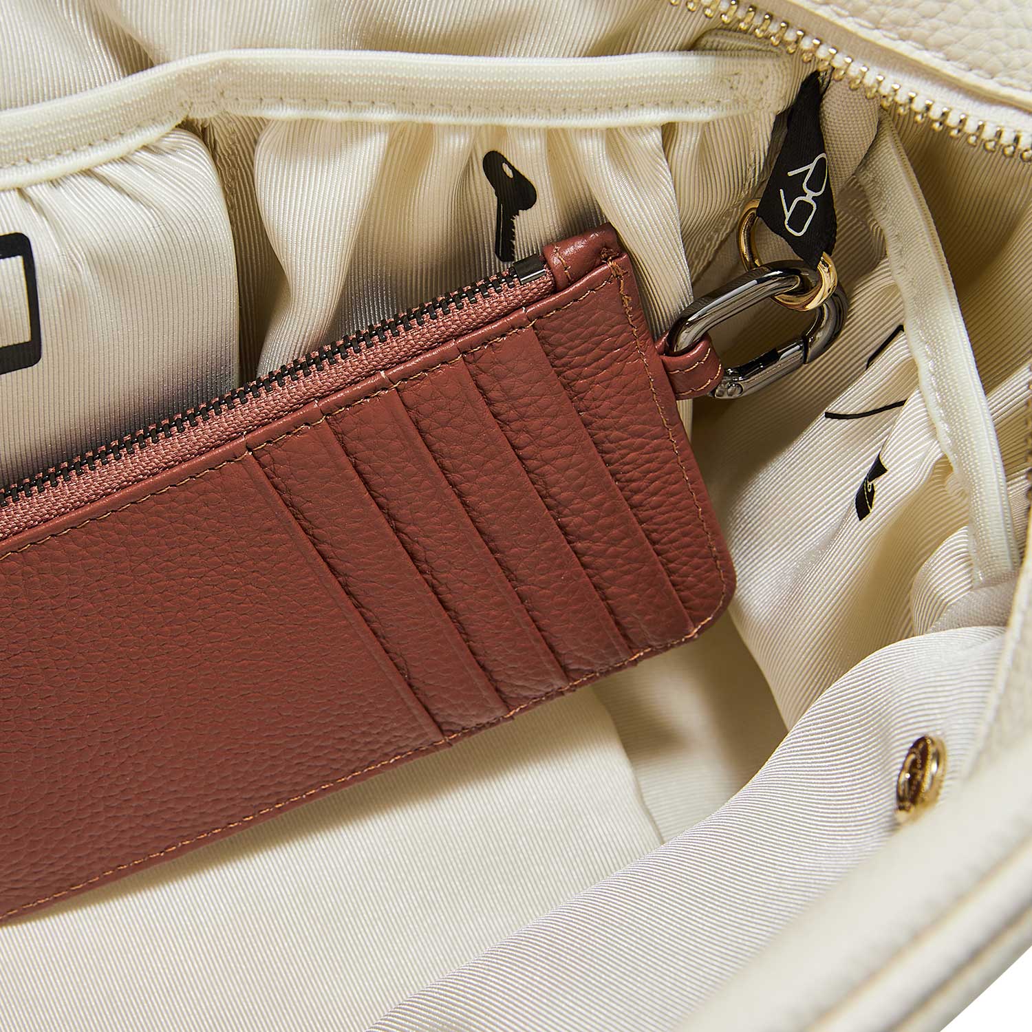 Victoria Hyde caramel genuine leather card holder, unisex &amp; multifunctional. Features 10 card slots, 1 ticket slot, zippered coin pocket, and detachable side closure.