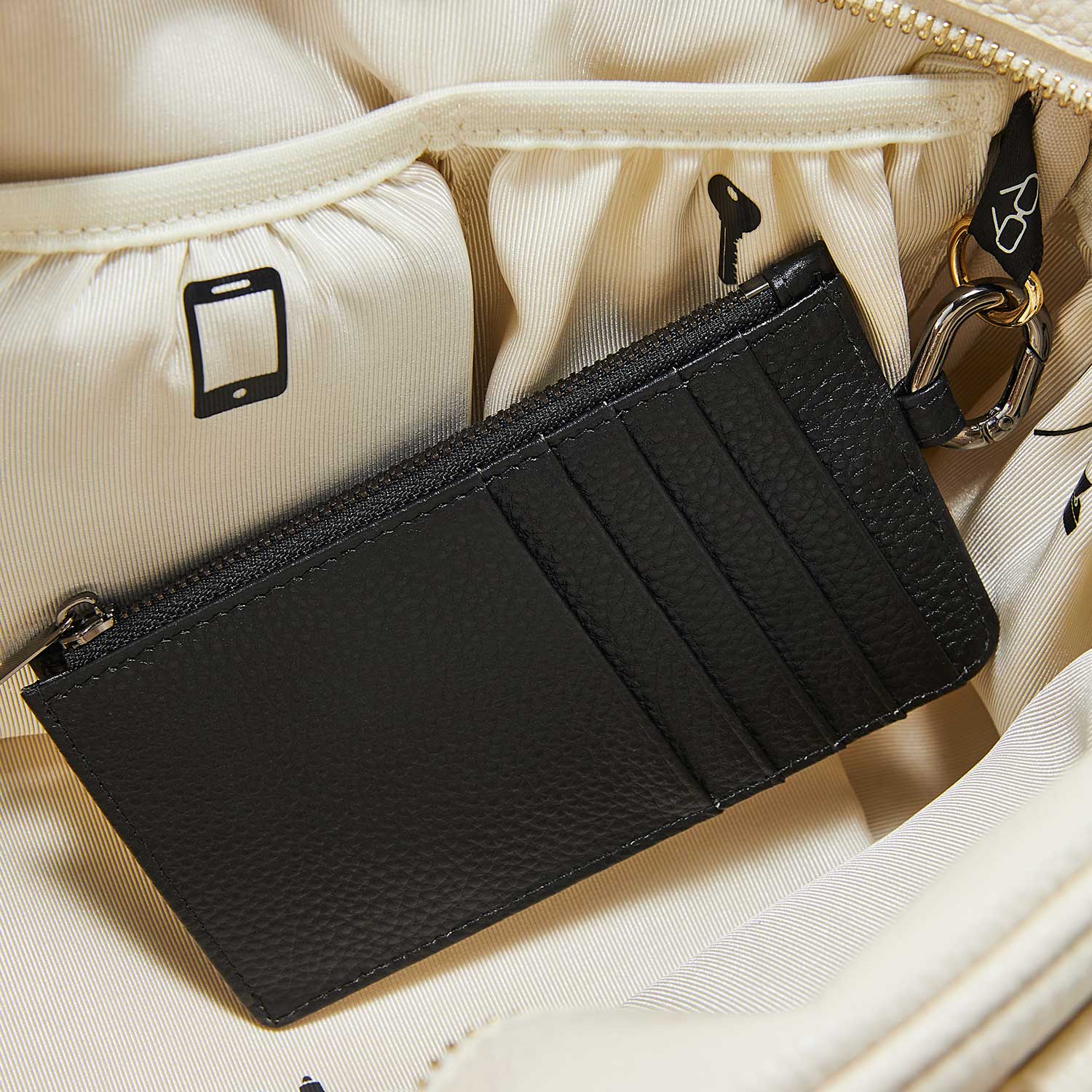 Victoria Hyde multifunctional genuine leather card holder in caramel color, unisex design with 10 card slots, ticket slot, coin pocket, and detachable closure.