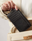 Victoria Hyde multifunctional genuine leather card holder in caramel color, unisex design with 10 card slots, ticket slot, coin pocket, and detachable closure.