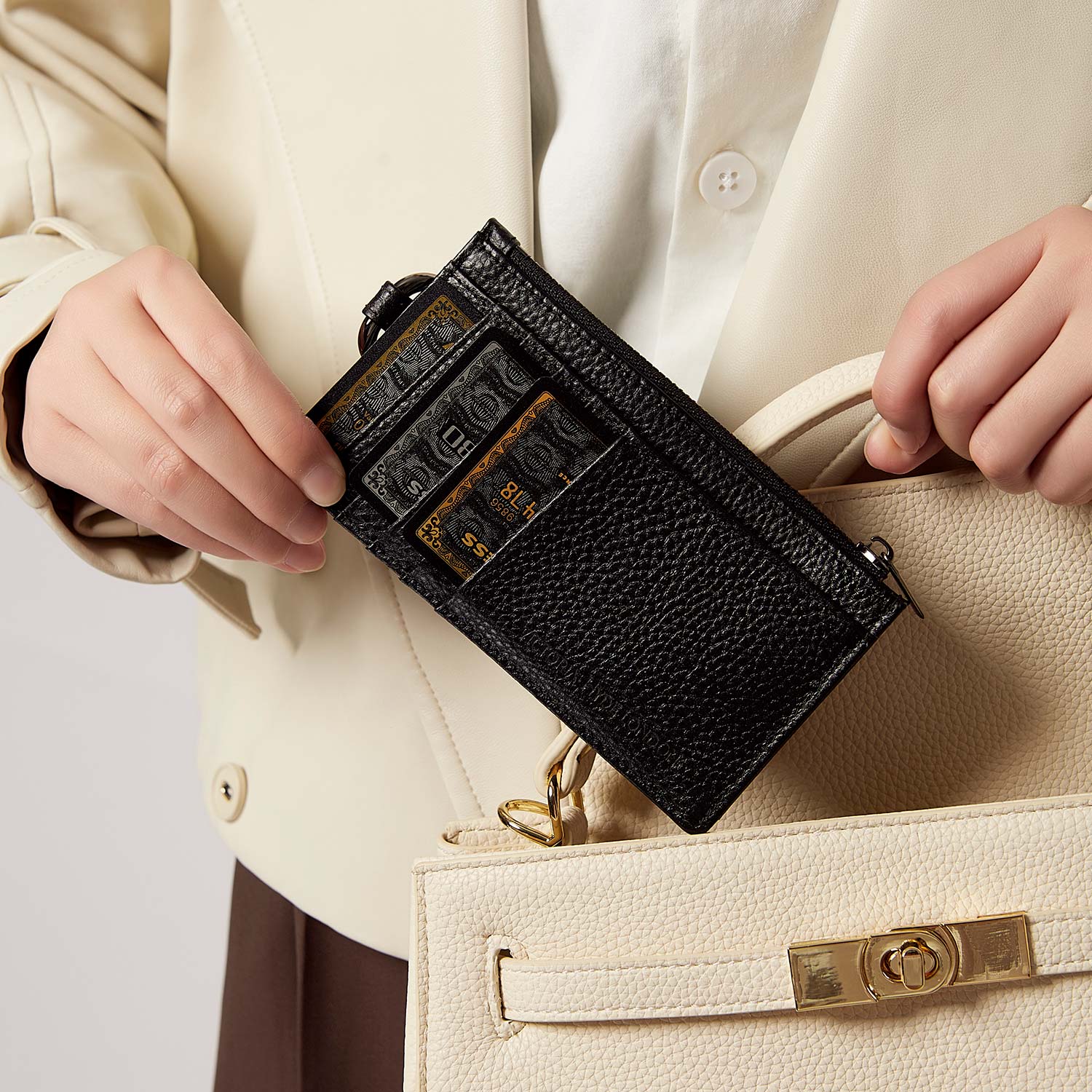 Victoria Hyde multifunctional genuine leather card holder in caramel color, unisex design with 10 card slots, ticket slot, coin pocket, and detachable closure.