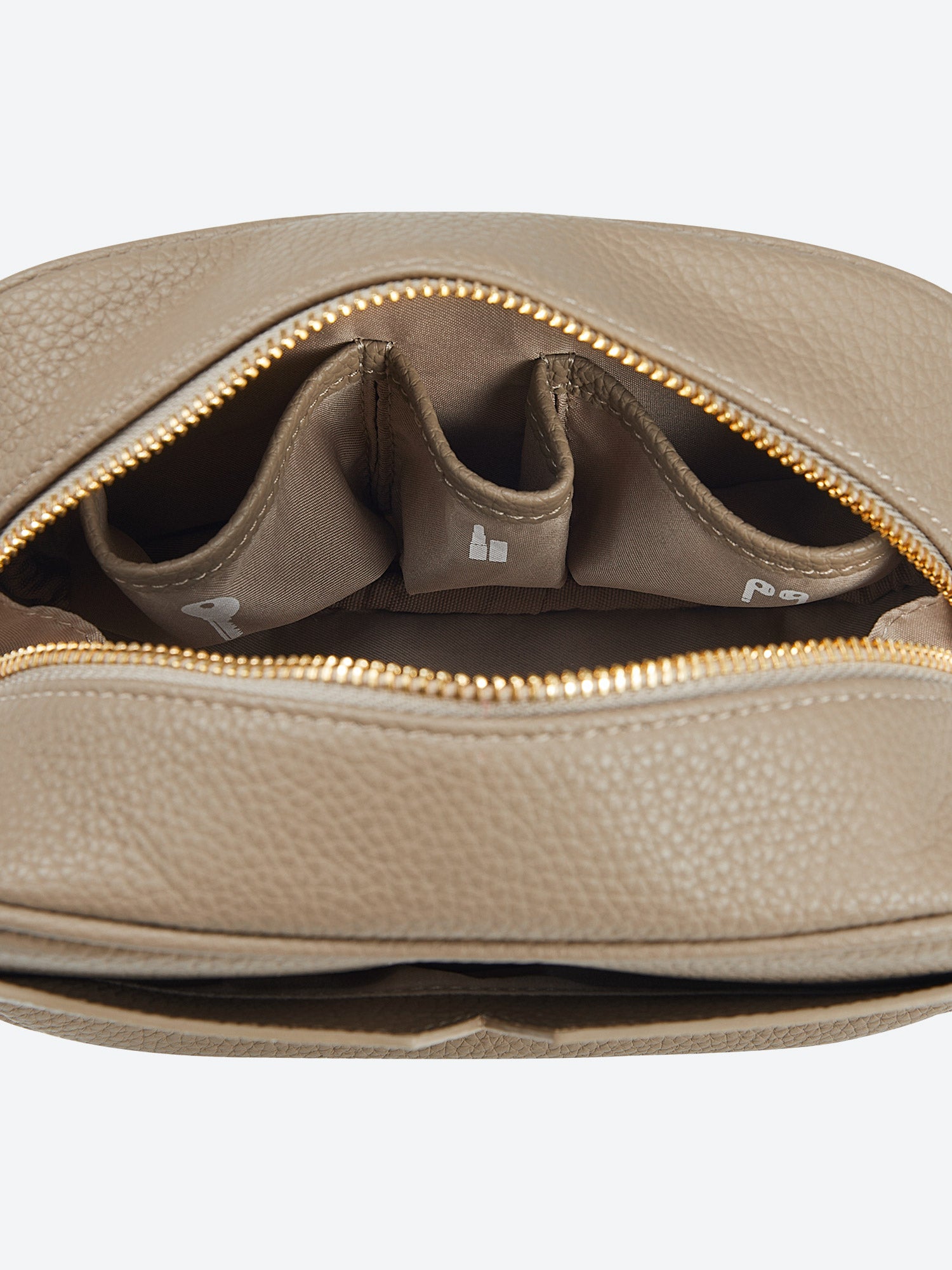 Victoria Hyde Antonia bag, light gold hardware, microfiber with recycled lining. Compact 18x10.5x9 cm, front pockets for keys, lipstick, earphones, slogan "Love what you do."