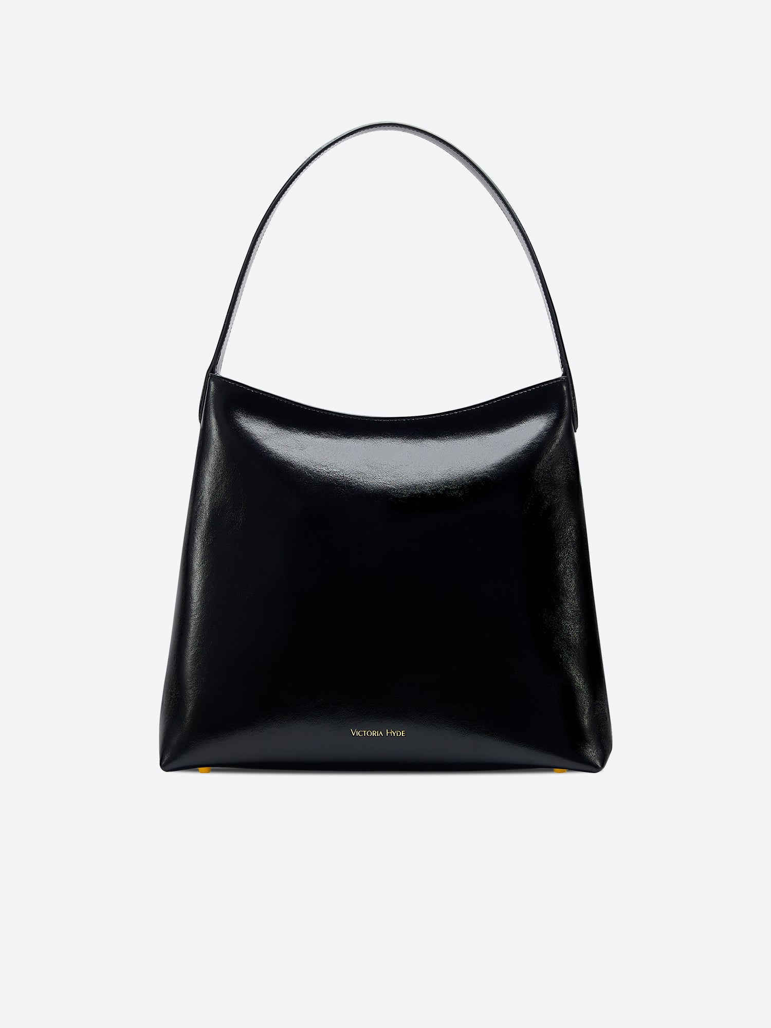 Victoria Hyde shoulder bag in microfiber leather with light gold fittings, padded sunglasses compartment, trolley strap, and inscriptions “Love what you do” and “New Work” for modern dynamic women.