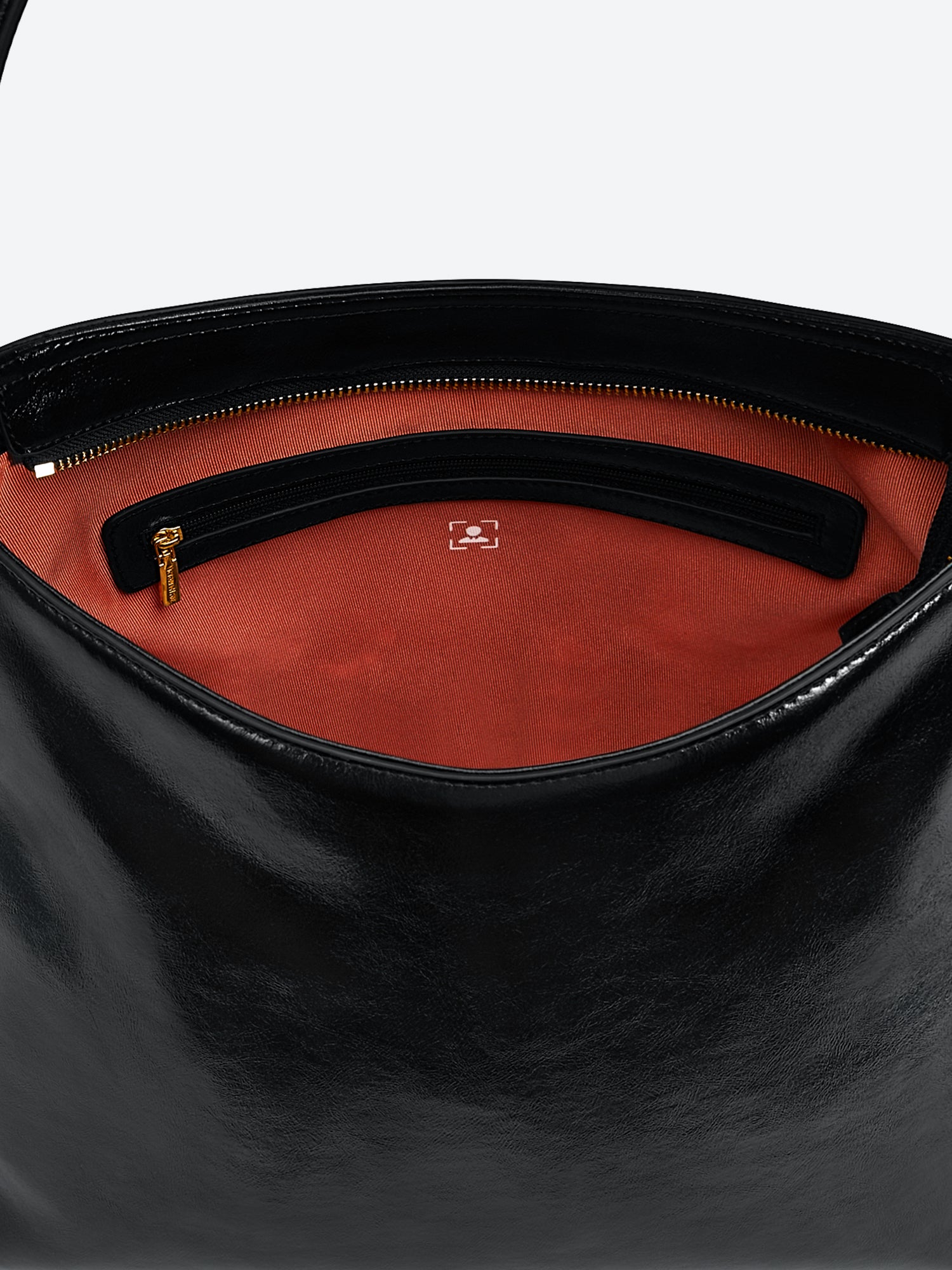 Victoria Hyde shoulder bag in microfiber leather with light gold fittings, padded sunglasses compartment, trolley strap, and inscriptions “Love what you do” and “New Work” for modern dynamic women.