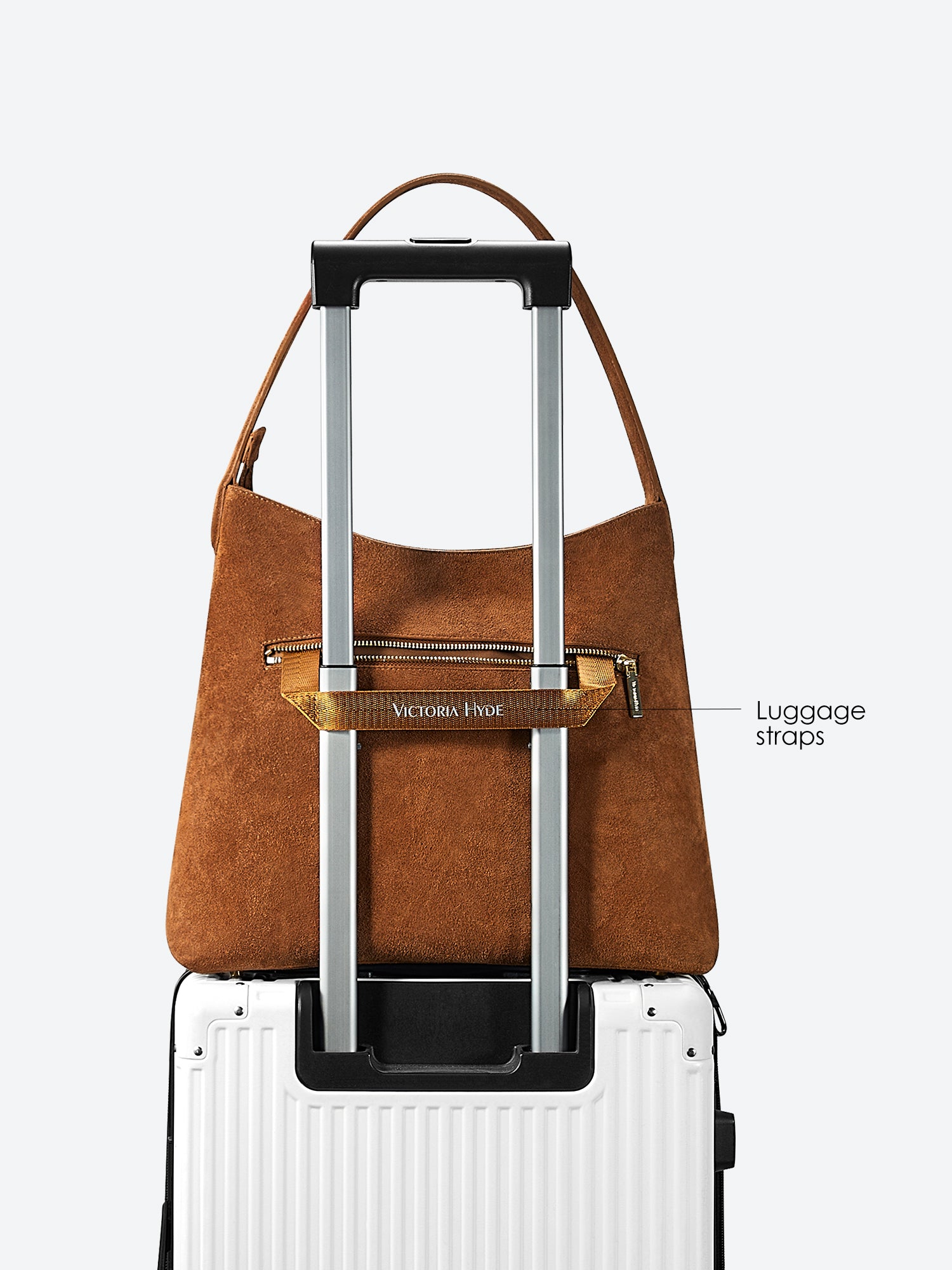 Victoria Hyde split leather shoulder bag for modern women. Light gold fittings, padded sunglasses pocket, trolley strap, “Love what you do” detail. 0.65 kg.