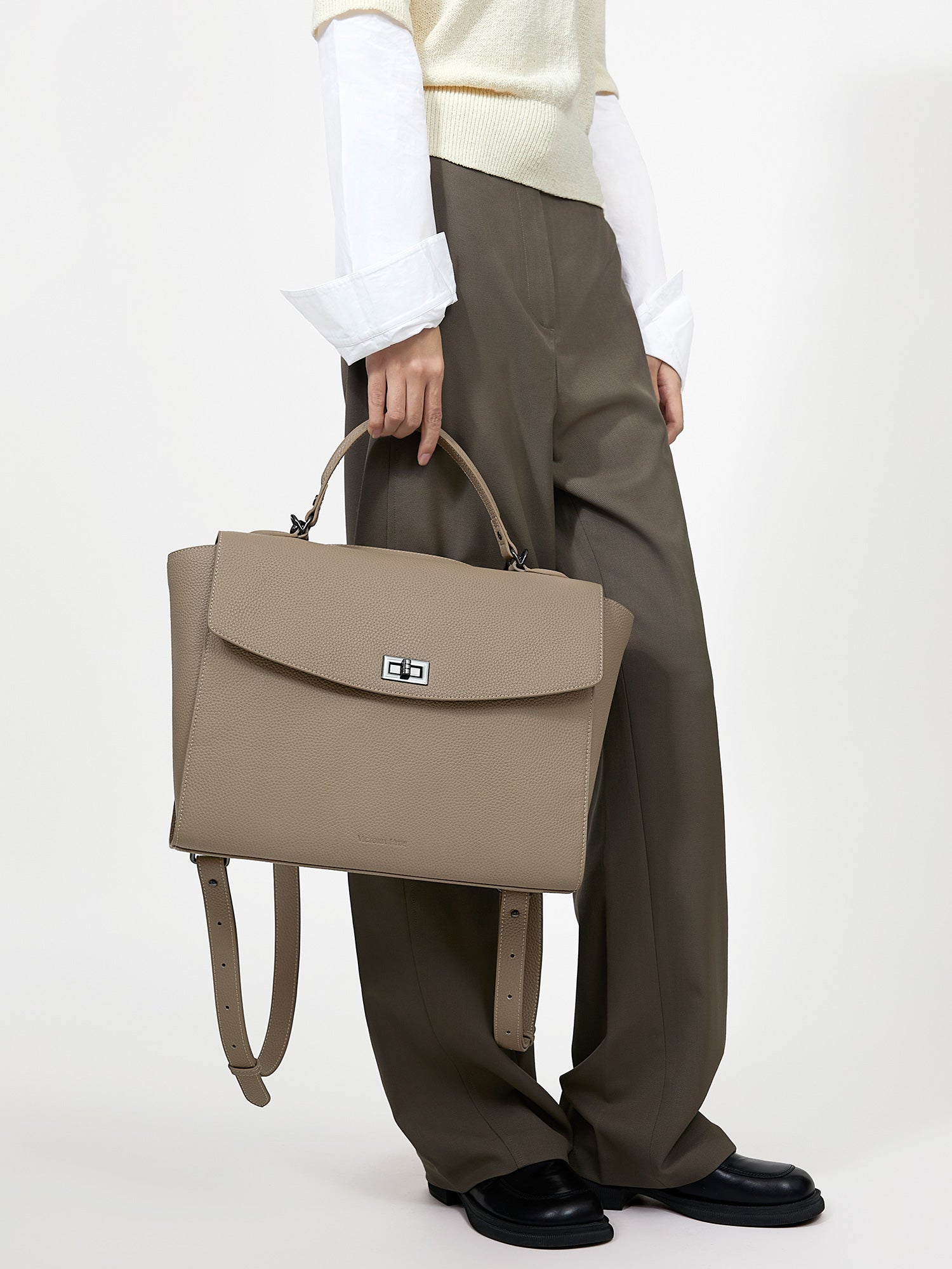 Victoria Hyde 2-in-1 backpack: stylish microfiber leather, converts from handbag to backpack with detachable straps, padded tablet compartment, lightweight.