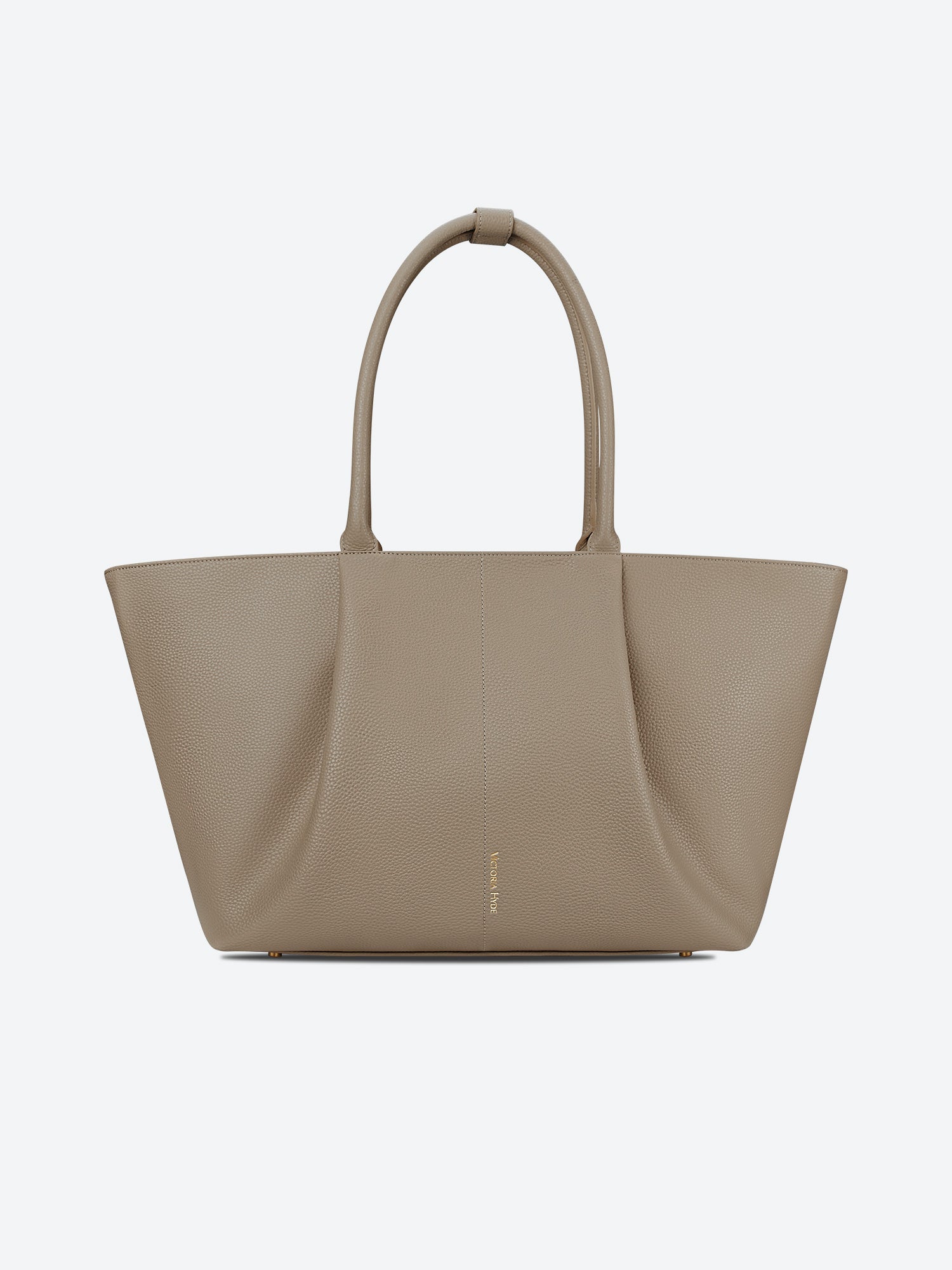 Victoria Hyde Ada laptop handbag in beige, stylish vegan leather business bag for women, featuring a padded compartment for up to 16-inch laptops.