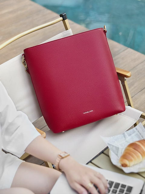 Kloey Business Bag in Garnet Red — modern work bag with 14" laptop compartment, smart interior organizer, sustainable microfiber leather, light gold hardware, for women in business.