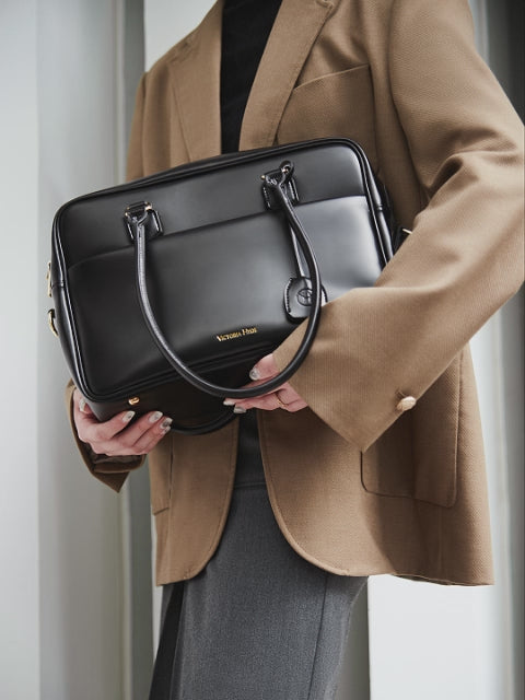 Margaret Large Black Work Bag — modern laptop handbag with 13" laptop compartment, smart interior organizer, removable cosmetic bag, vegan water-repellent microfiber leather, for women in business.