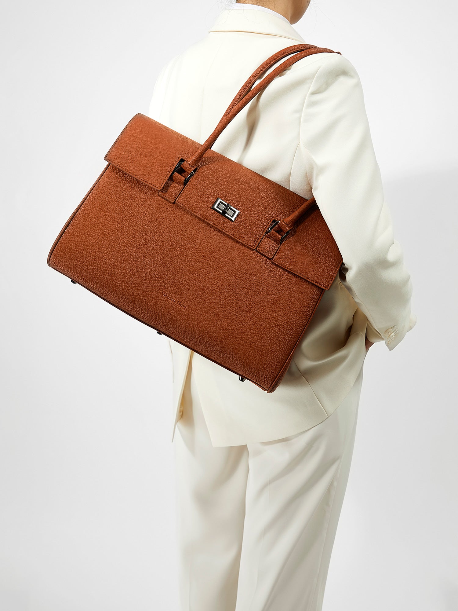 Victoria Hyde Jolene large brown work bag with 16" laptop compartment, removable cosmetic pouch, vegan, water-repellent, smart organization.