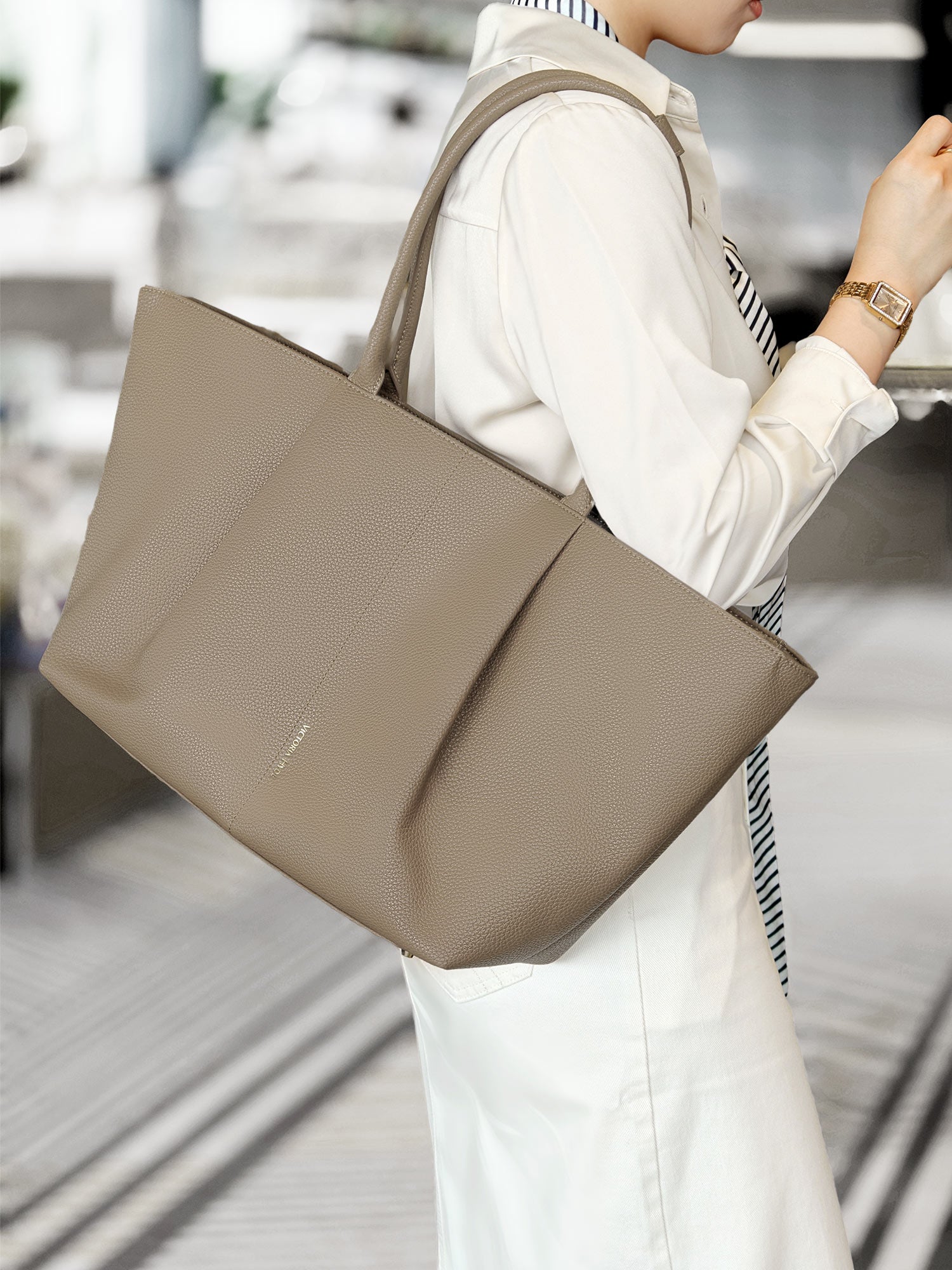 Victoria Hyde Ada business laptop bag in beige, stylish vegan leather shoulder bag for women, designed for up to 16-inch laptops and daily commute