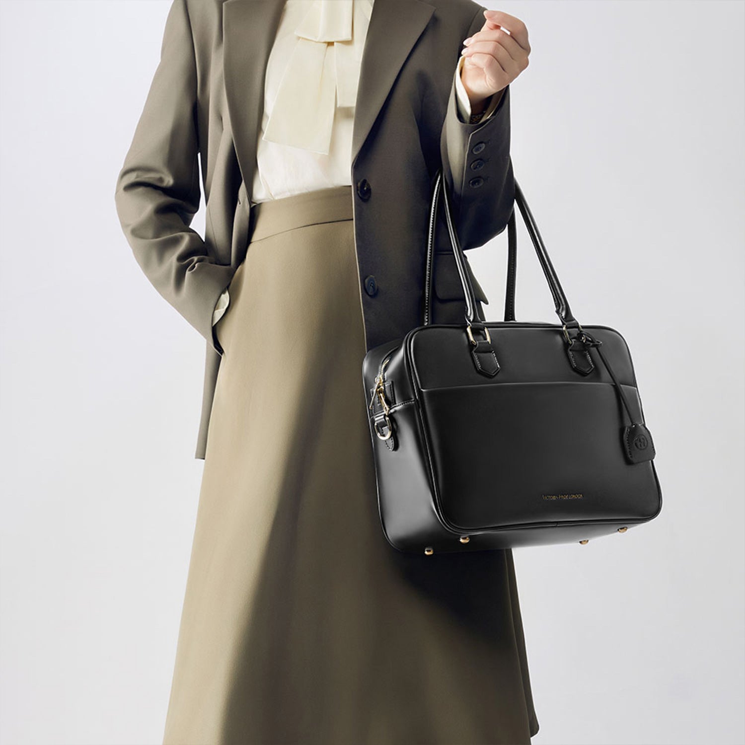 Victoria Hyde Margaret large black work bag with 13" laptop compartment, removable cosmetic pouch, vegan, water-repellent, smart interior.